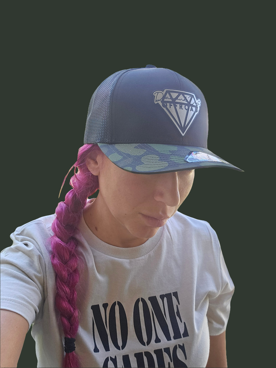 Black and green camouflage bill snapback- stainless logo