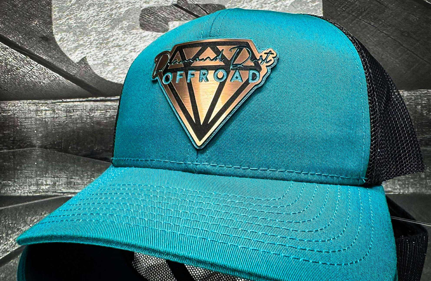 Teal snapback with black mesh - teal/stainless logo
