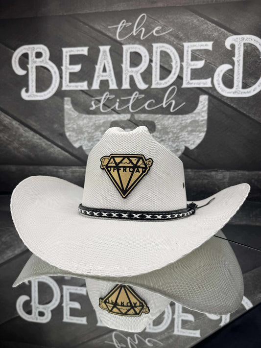 White with gold metal logo cowboy hat